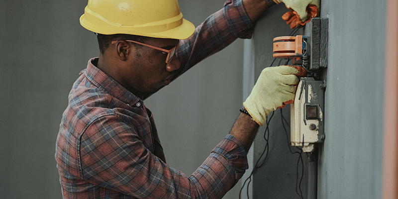 An electrician fixing wires